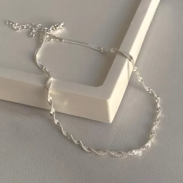 TOBILLERA CLAPTON TORZADA (21-26CM) ACERO BLANCO
