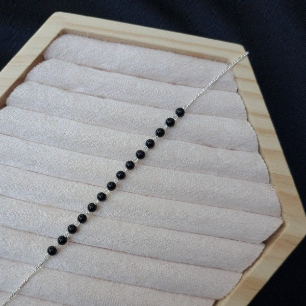 PULSERA BOLITAS NEGRAS