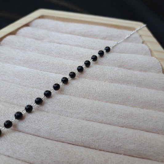 PULSERA BOLITAS NEGRAS